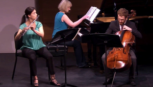 A photo of violin, piano and cello trio, Lakeshore Rush