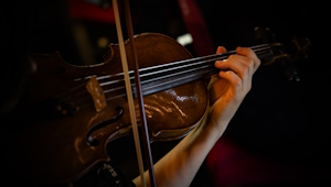 A person playing the violin