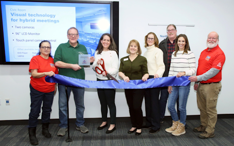 Members of the Library Board and Northbrook Civic Board at a ribbon cutting