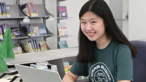 A photo of a summer reading staff member